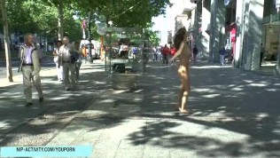 Naughty naked babe has fun on public streets