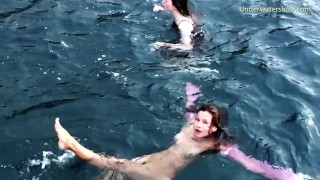Underwater swimming girls on Tenerife